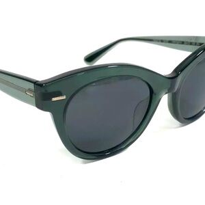 Oliver Peoples with The Row  sunglasses.